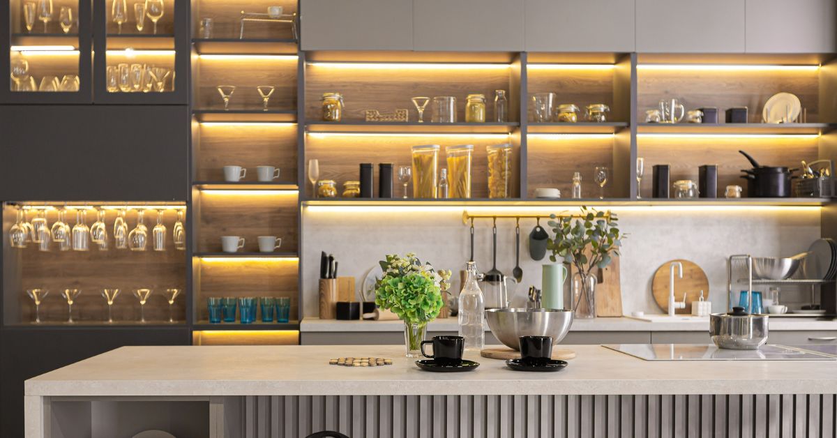 do-led-lights-get-warm stylish luxury kitchen interior in an ultra-modern spacious apartment in dark colors with super cool led lighting and an island for cooking
